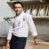 Chef Gaetano "Guy" Arnone standing in a kitchen