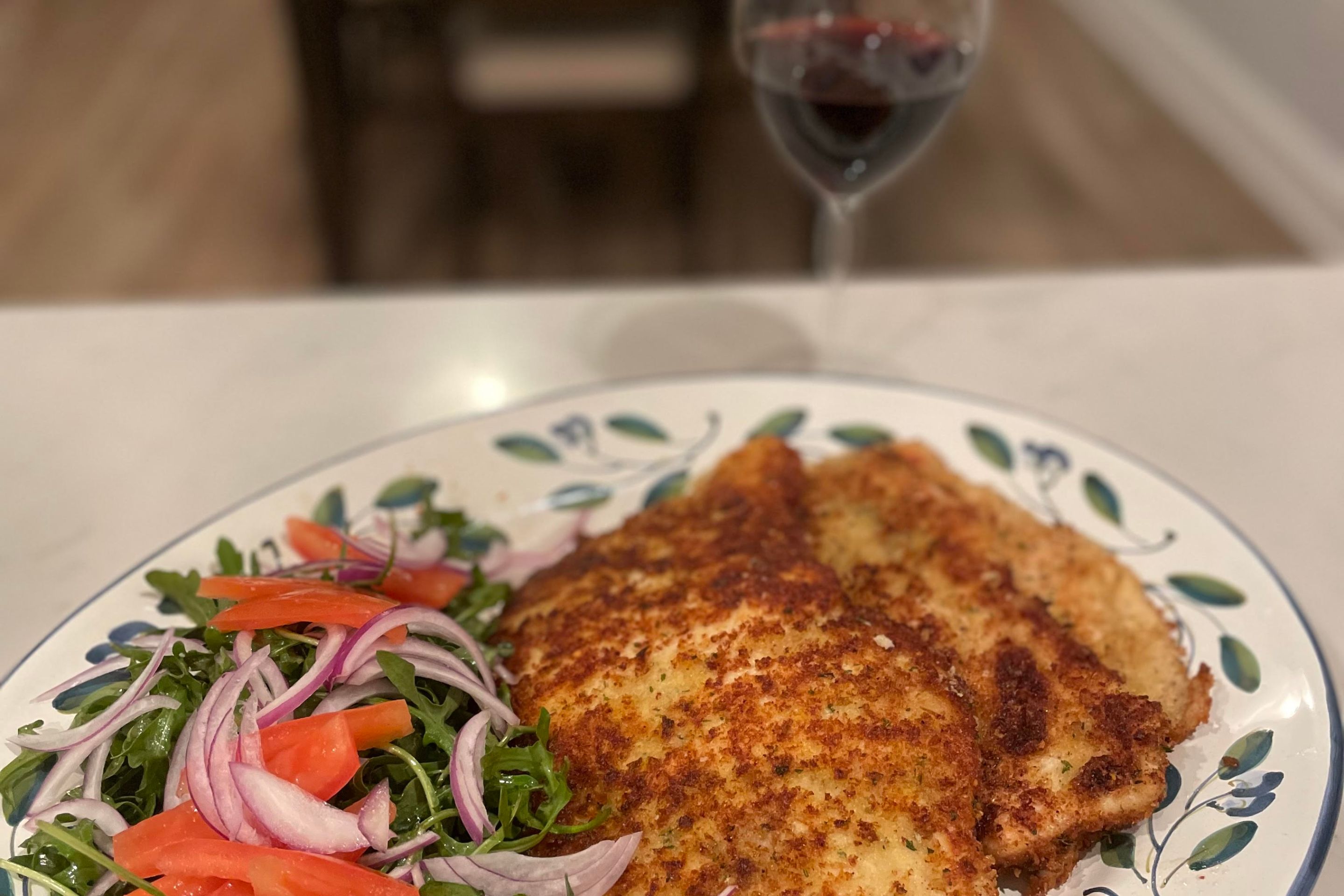 Chicken cutlets on a plate with a salad
