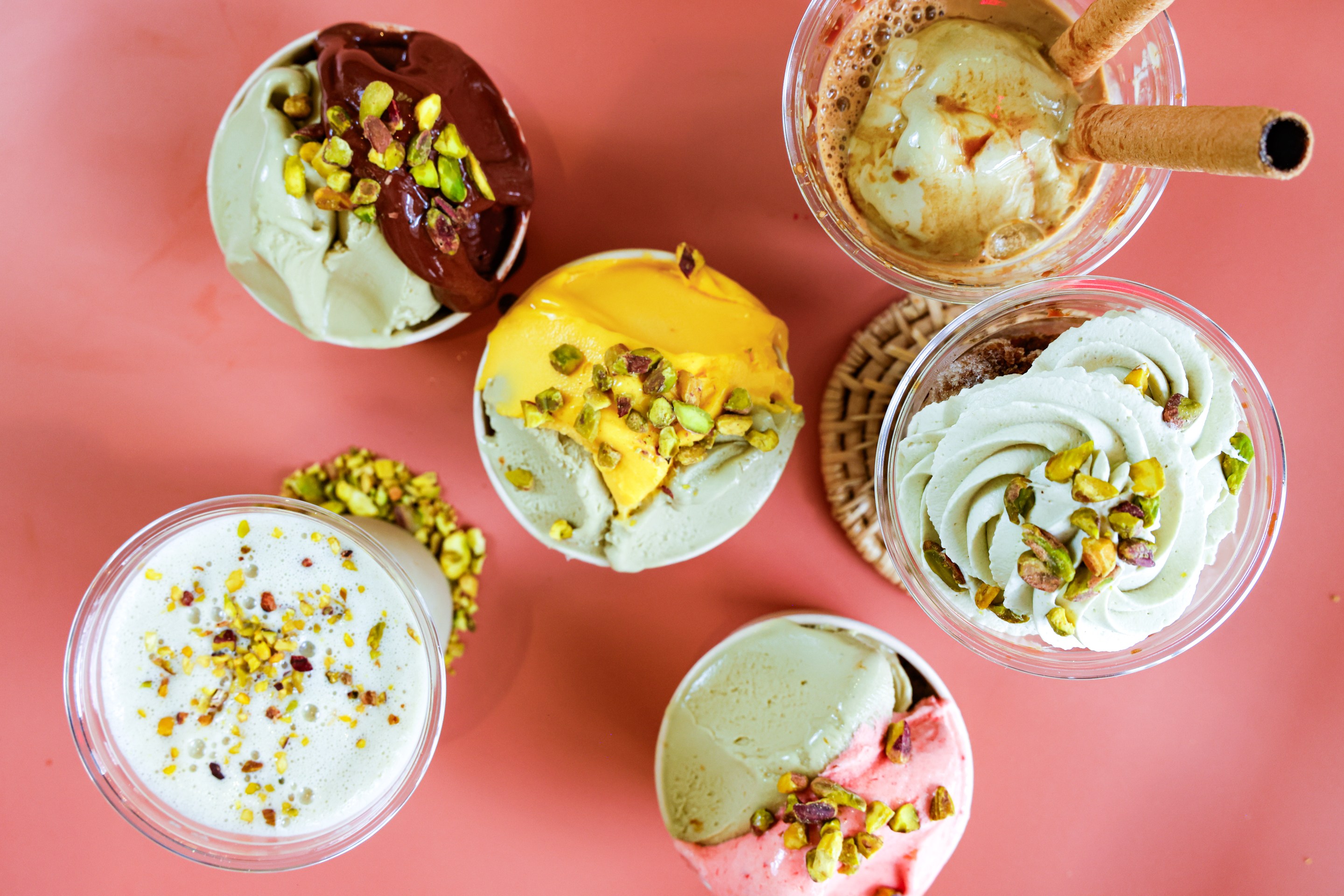 An overhead photo of pistachio gelato variations