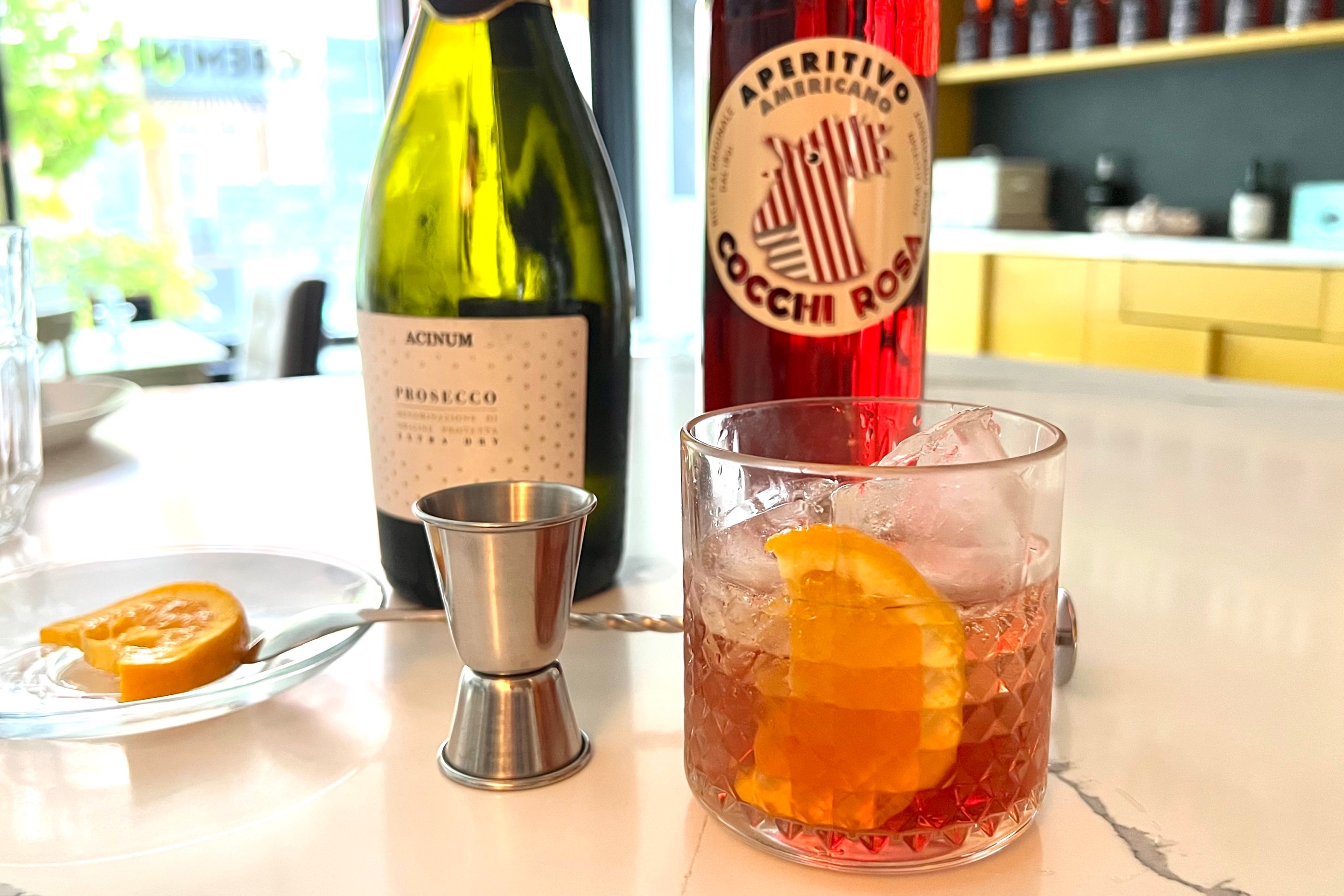 a "Pink spritz" cocktail and ingredients