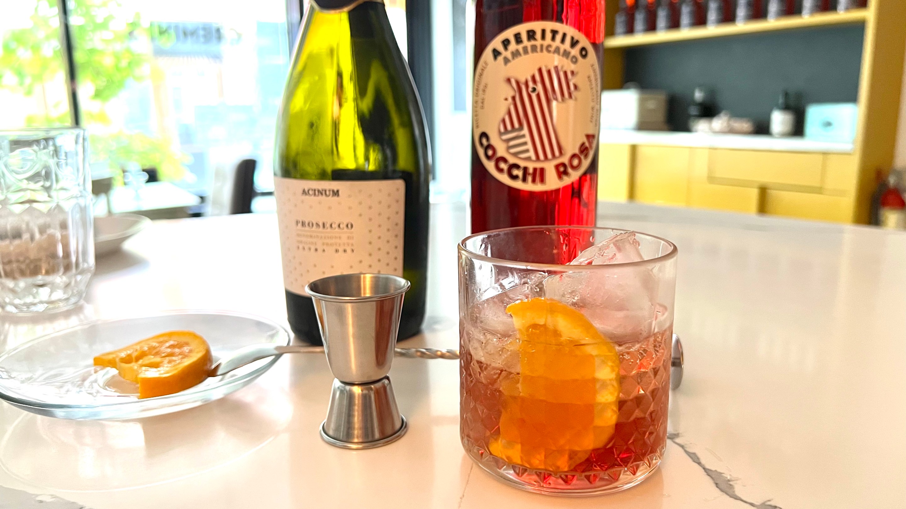a "Pink spritz" cocktail and ingredients