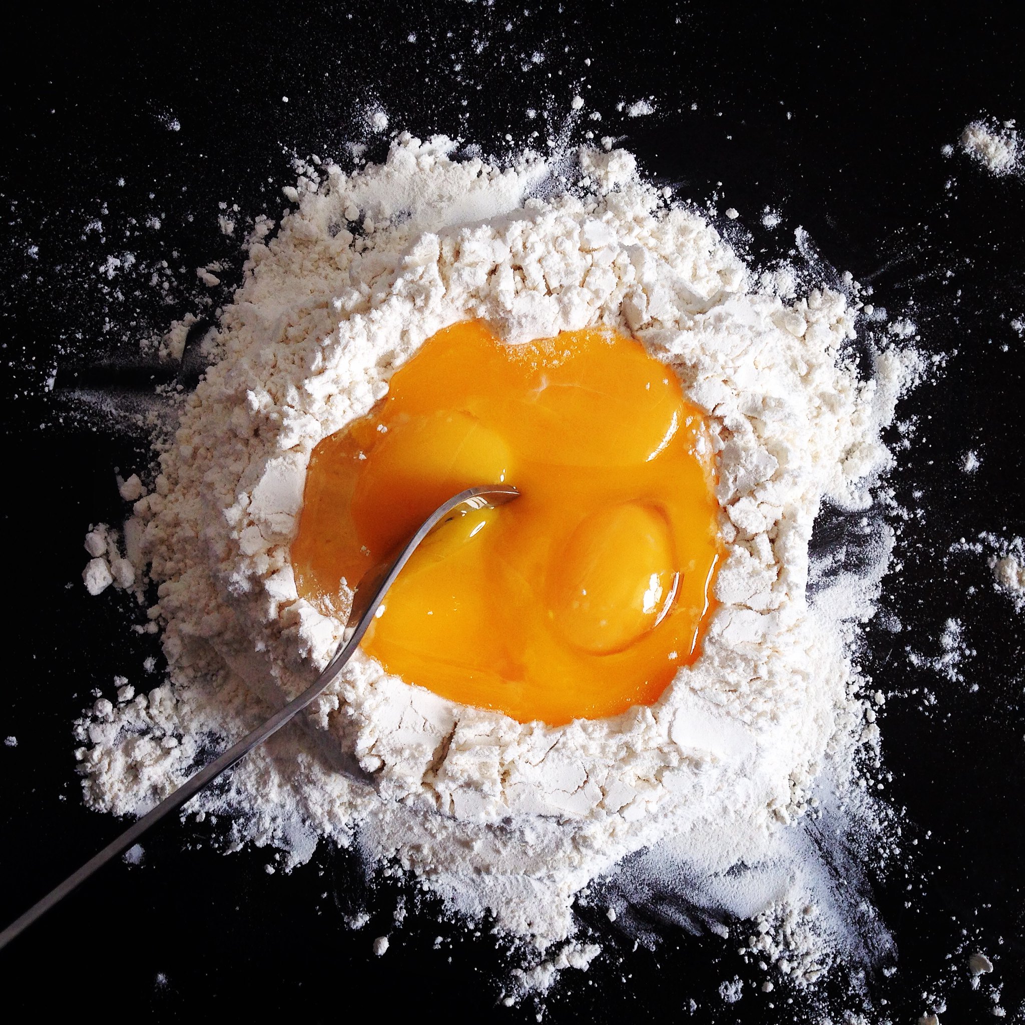 eggs in flour to make pasta