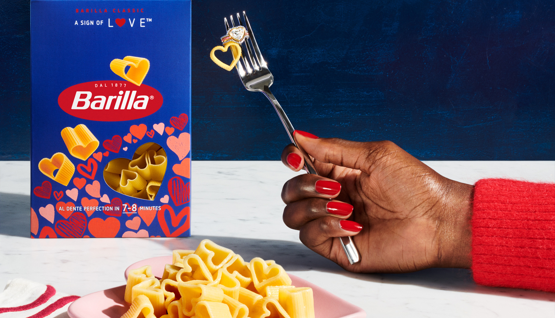 Barilla Love box and hand holding fork