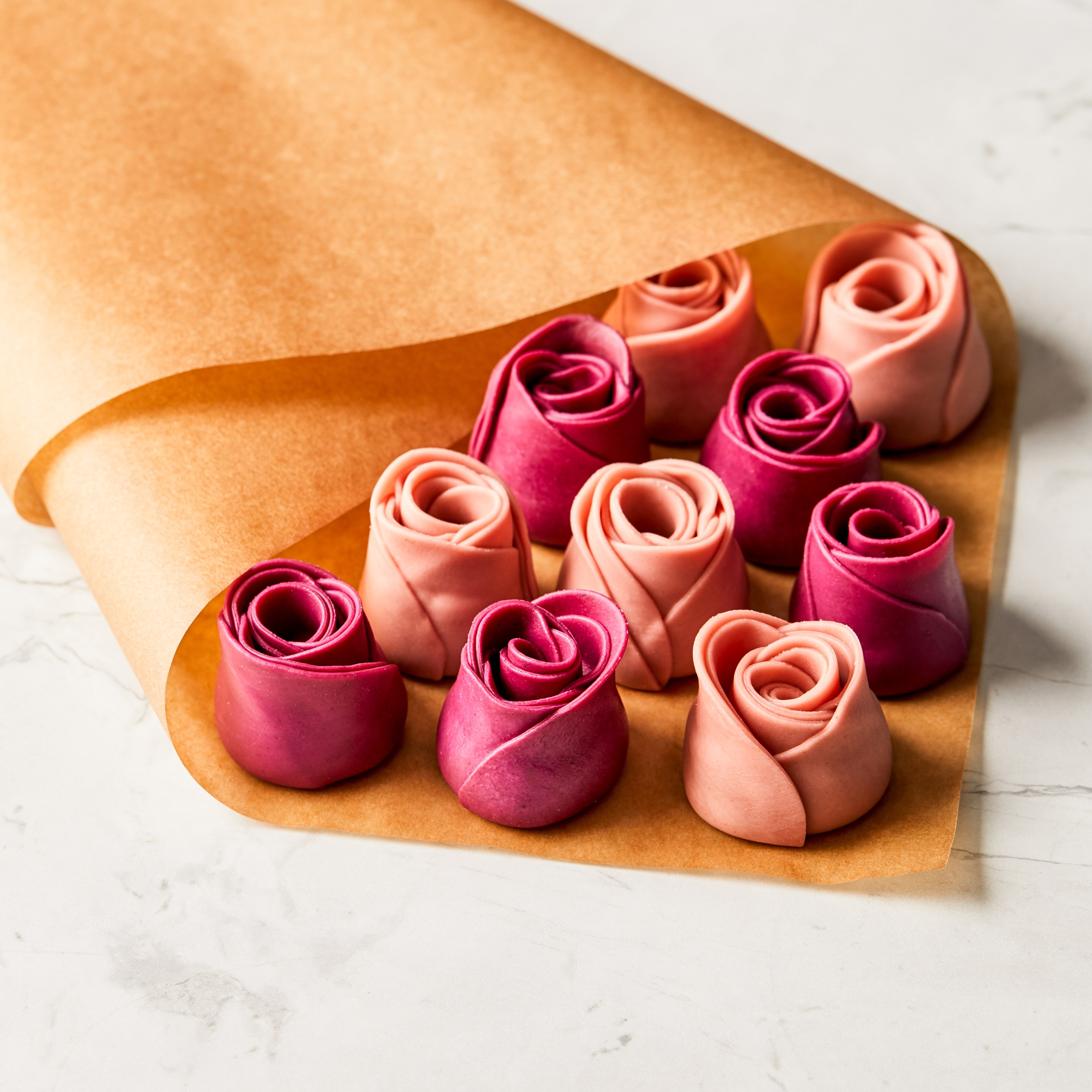 Rose-shaped ravioli on butcher paper