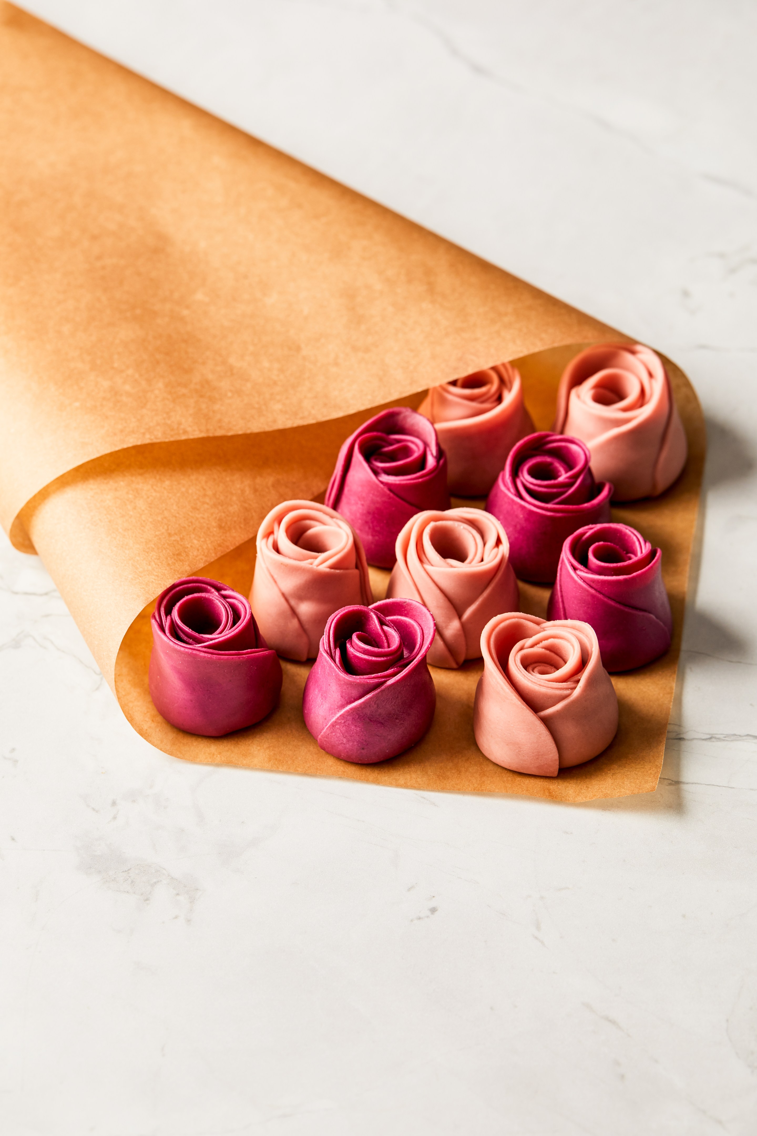 Rose-shaped ravioli on butcher paper