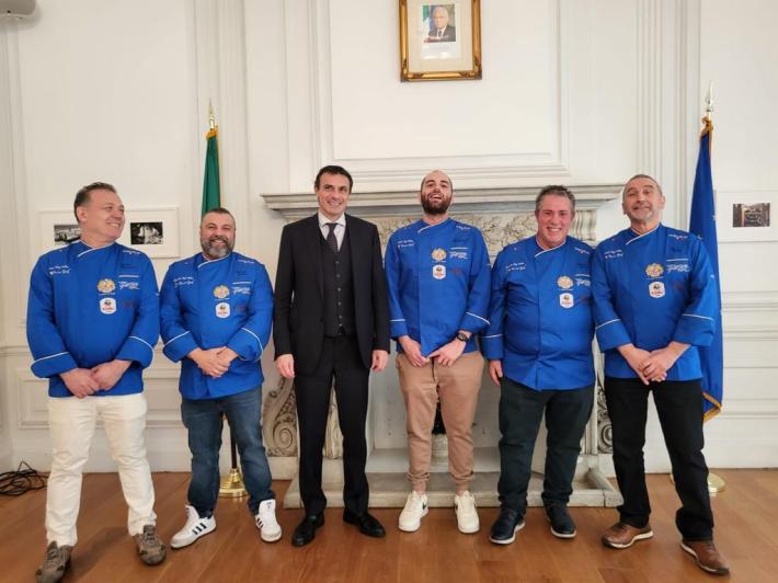 Chef Mauro Campanale (center, right) with Italian Consulate General, Fabrizio Di Michele (center, left) as part of National Italian Chef Team.