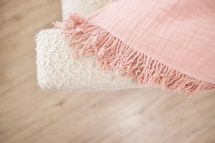 Muslin Comfort’s Oversized Fringe Throw In Blush