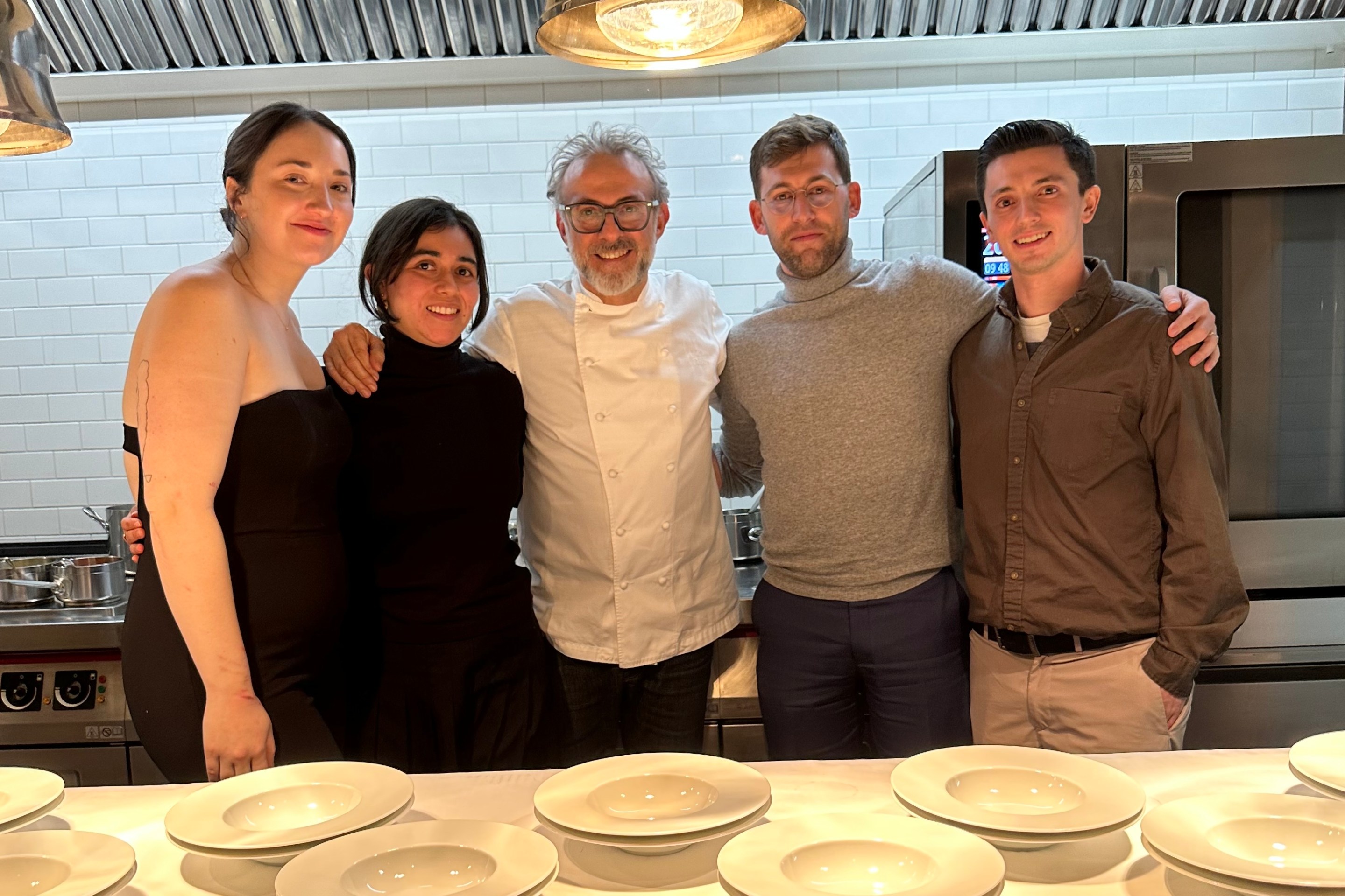 Massimo Bottura posing with guests