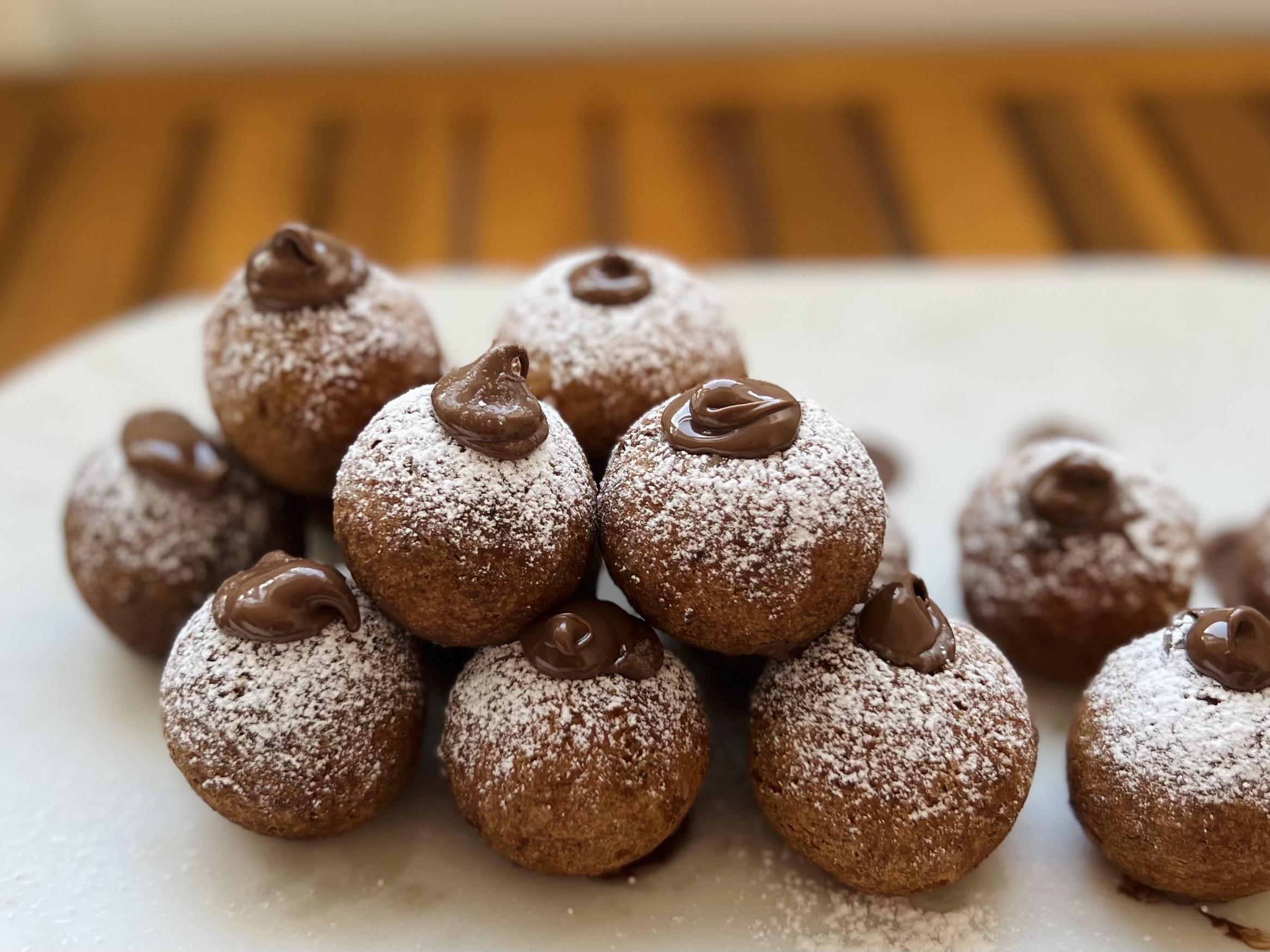 Pumpkin Spiced Ricotta Beignets with Nutella Filling.