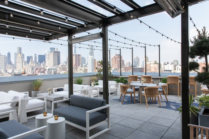 Outdoor terrace overlooking a city skyline