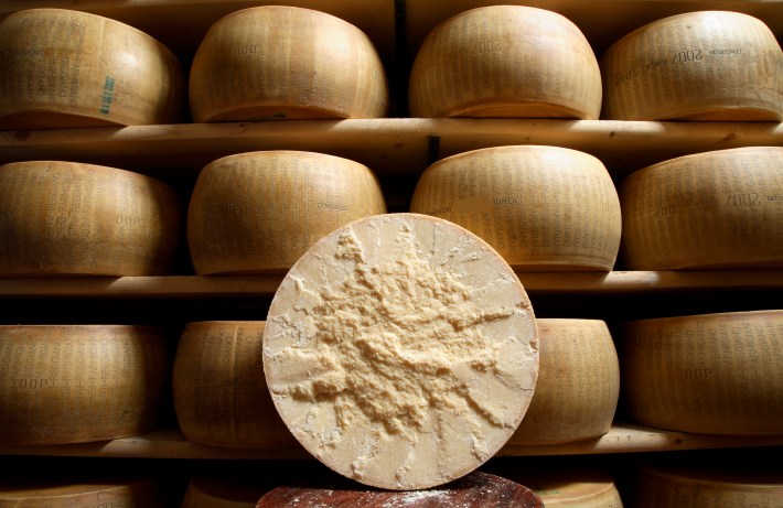 Wheels of Parmigiano Reggiano at Ferrarini in Emilia-Romagna, Italy.