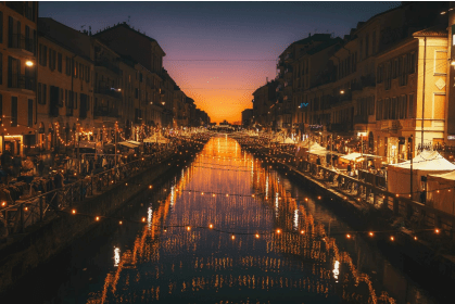 Milan's canal-based area of Navigli at night. Photo by Cristina Gottardi on Unsplash.