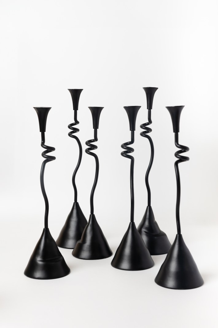 Reverly winding taper candle holders