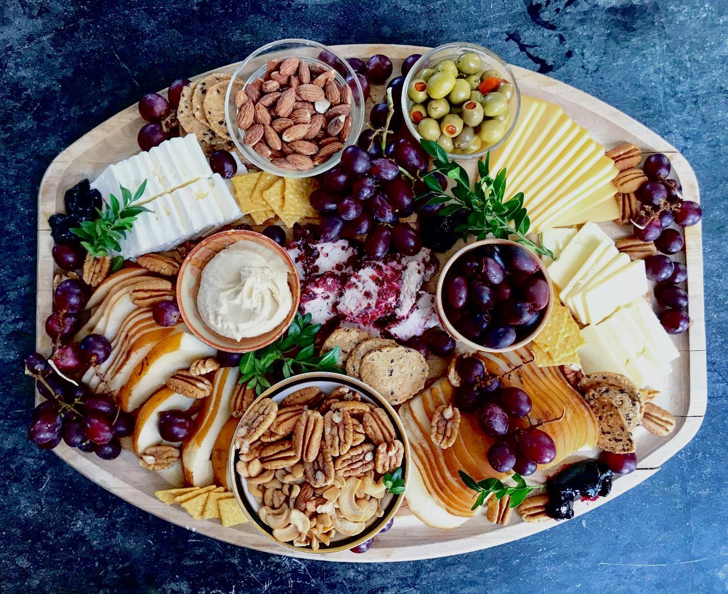 Cheese board with fruit and nuts