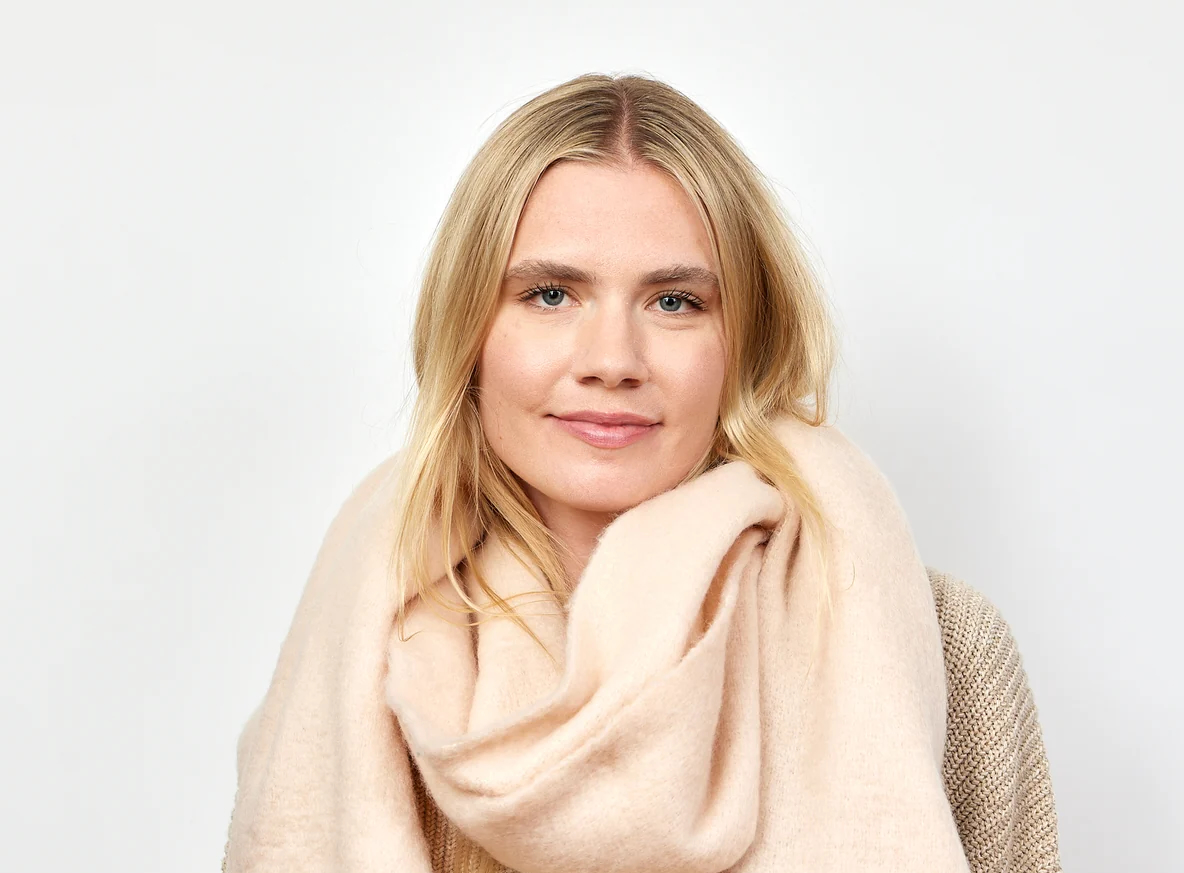 Blonde woman wearing Scarf