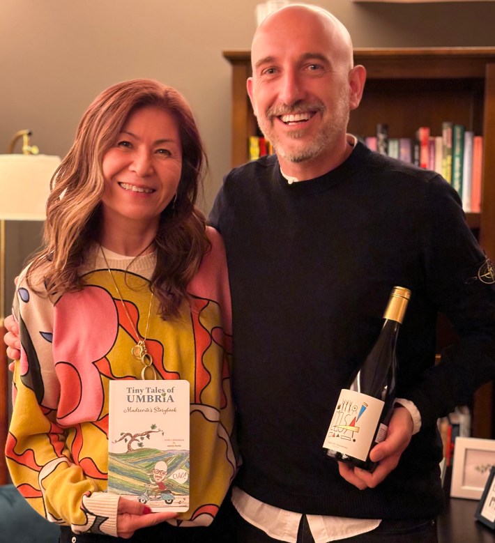 Author and illustrator, Marisa Finetti, with winemaker Nicola Chiucchiurlotto.