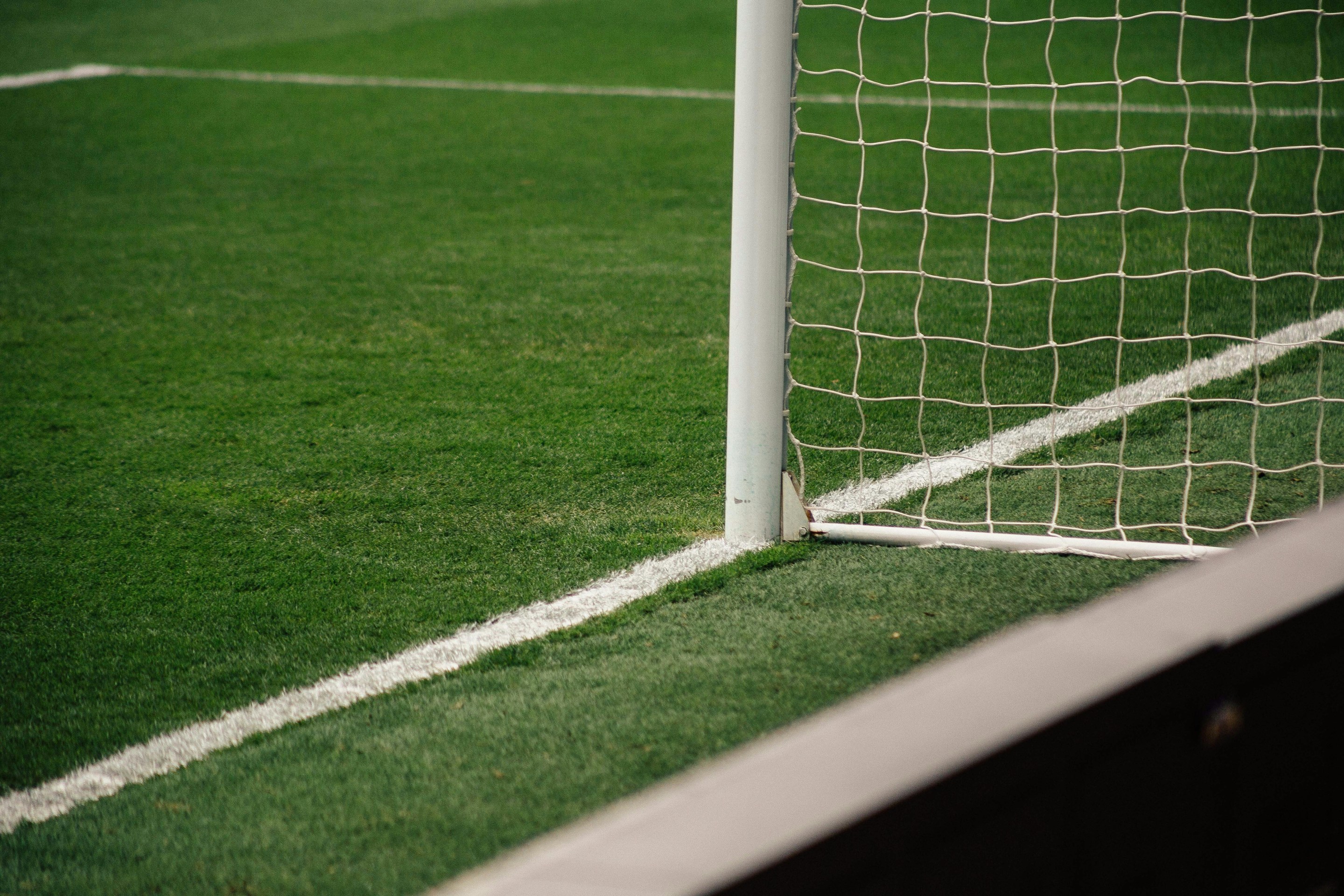 close-up of soccer pitch and part of a goal