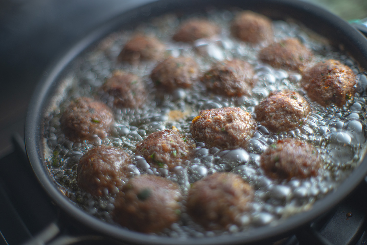 Meatballs frying in the kitchen of Cathy Caluccio Fazzolari. Photo by Daniel Paterna.