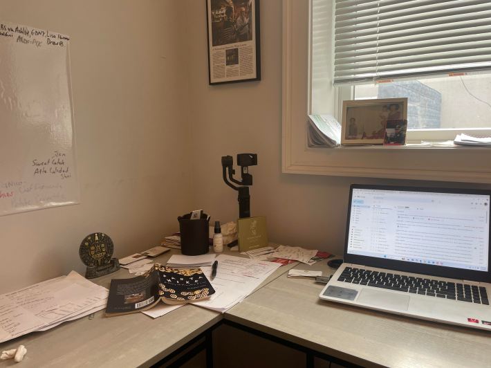 The desk of Appetito Editor-in-Chief Andrew Cotto in need of decluttering.