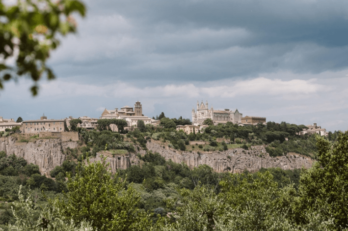 The skyline of majestic Orvieto, featuring the Duomo of Orvieto in the distance.