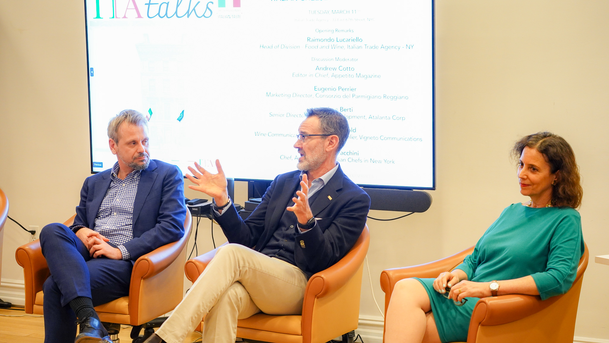 The ITA Talks "Aged to Perfection" panel of Eugenio Perrier (center) of Consorzio del Parmigiano Reggiano, Andrea Berti (left) of Atalanta Corporation, and Susannah Gold (right) of Vigneto Communications.