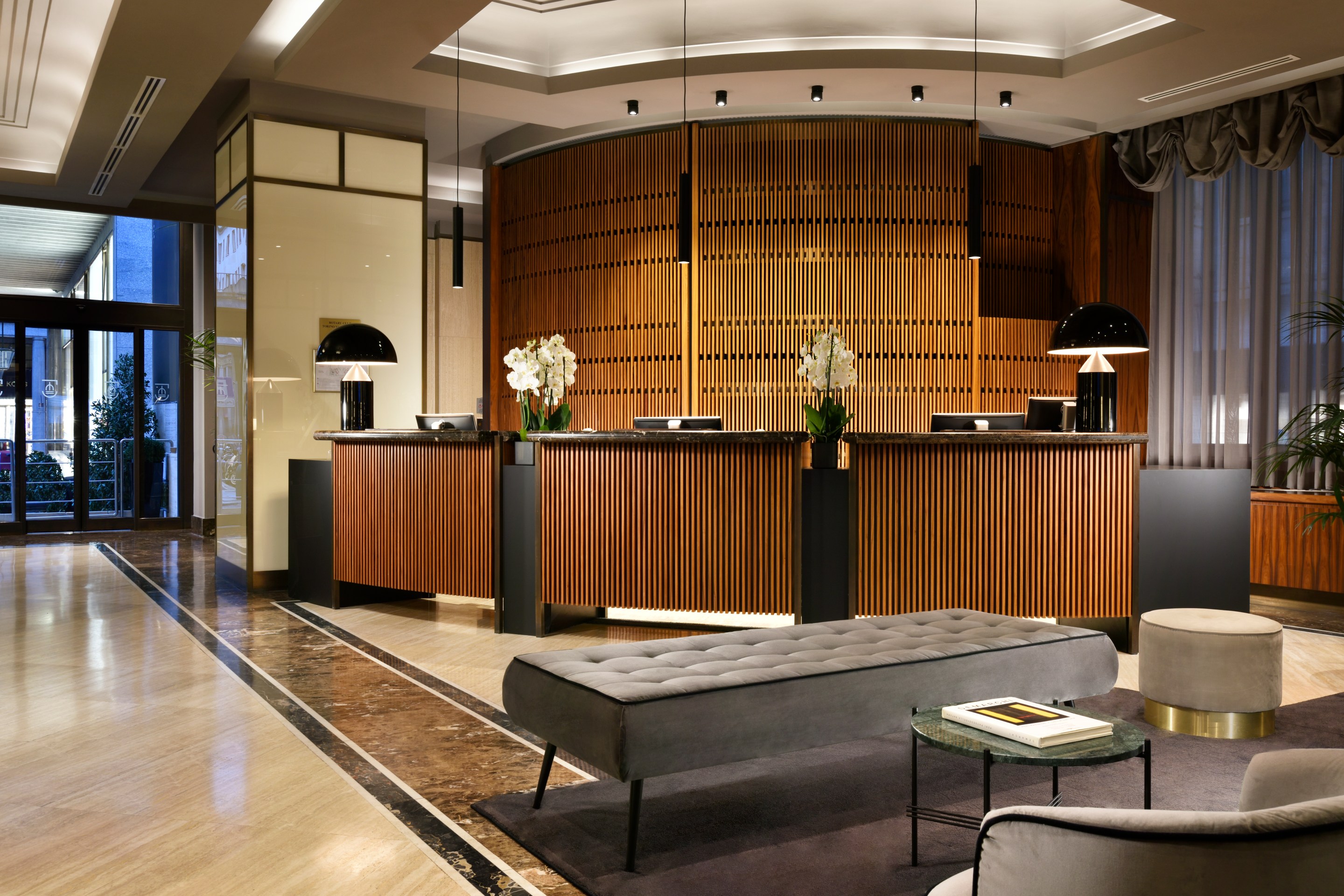 An elegant and welcoming lobby awaits guests upon arrival at the Principi di Piemonte hotel. Photo by Claudia Venditti via Gruppo UNA.