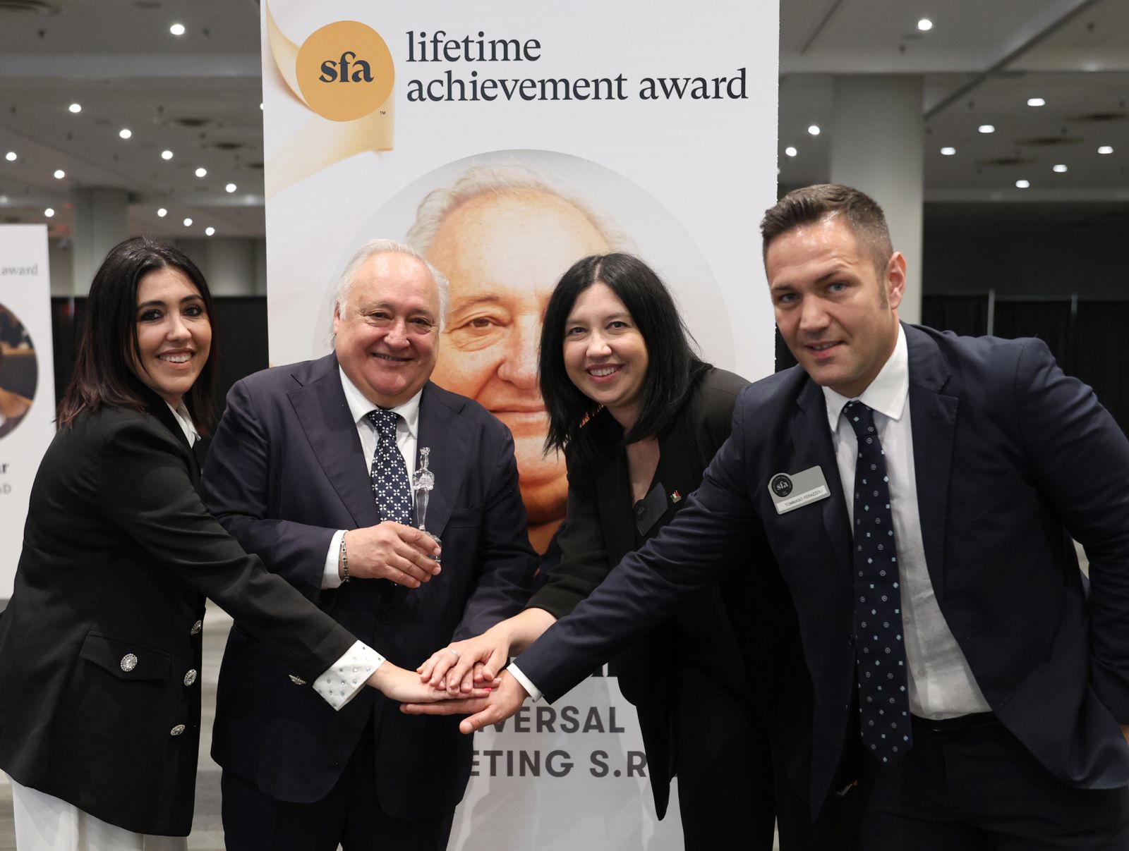 Donato Cinelli and team receiving a lifetime achievement award
