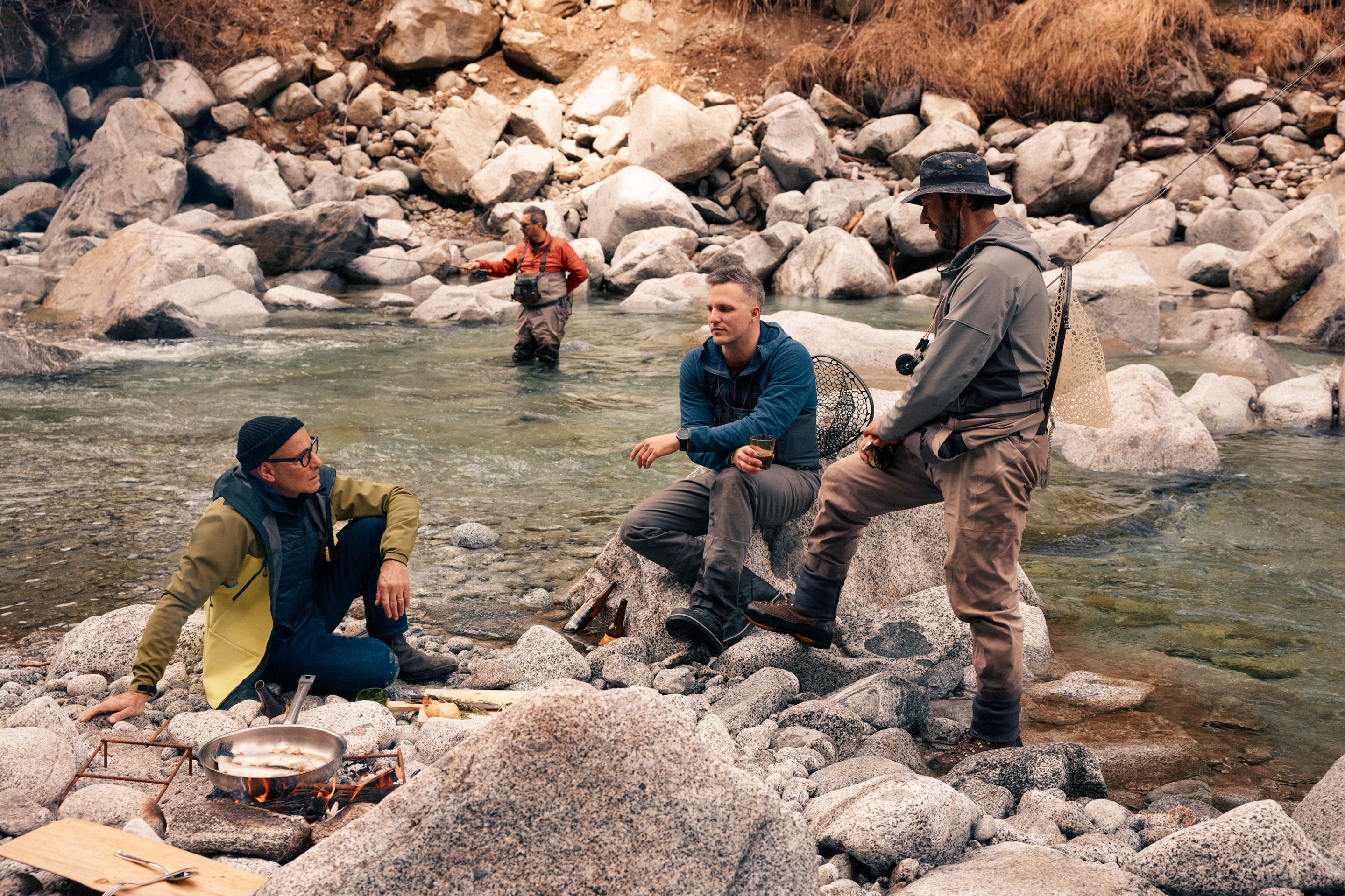 Tucci and locals discussing life in Italy while fishing.