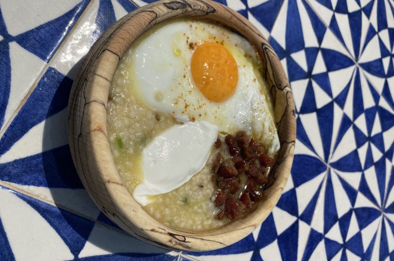 Trahanas with Greek Sausage, Gruyere and Fried Eggs