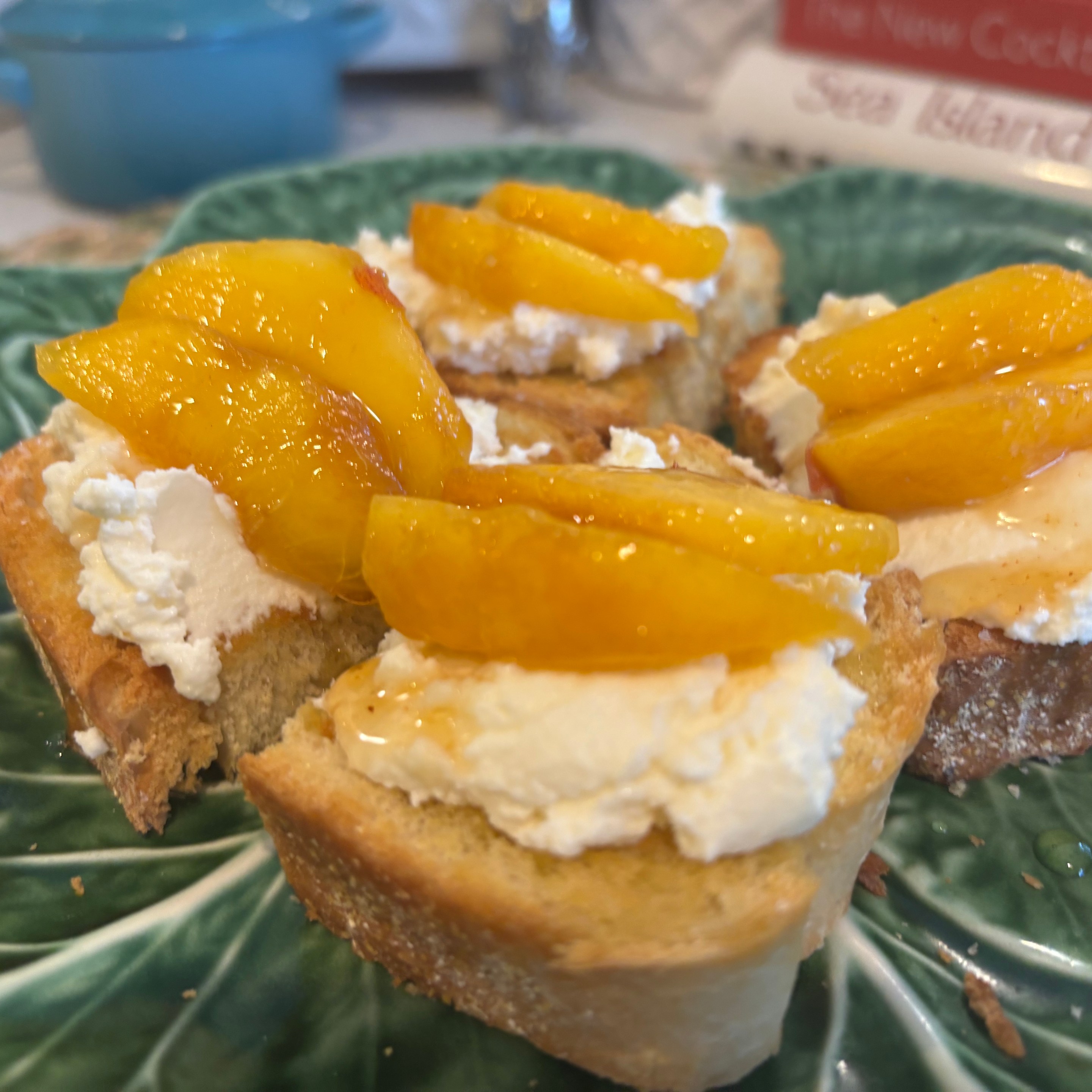 Homemade ricotta crostini with summer peaches.