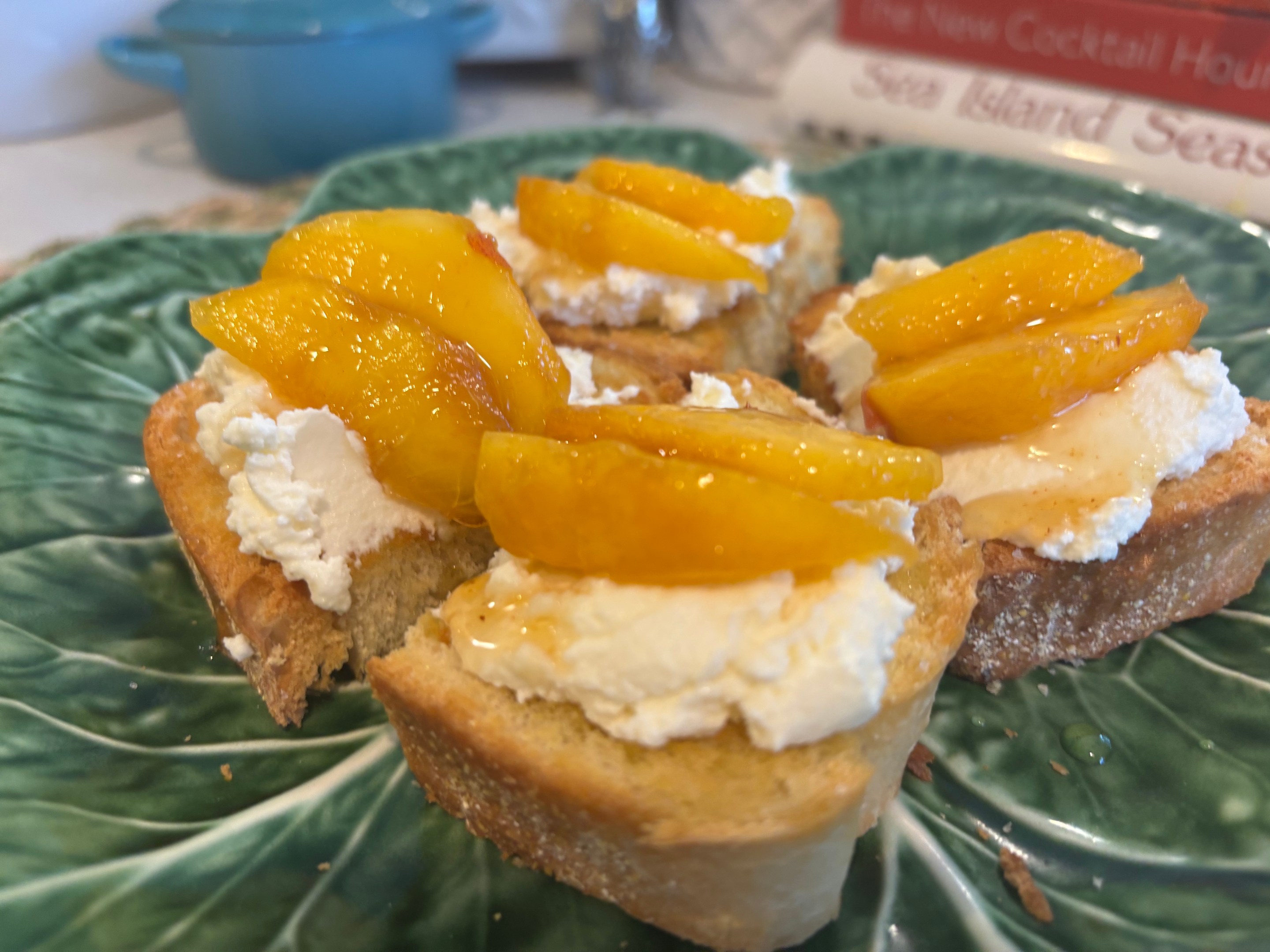 Homemade ricotta crostini with summer peaches.