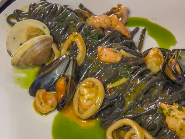 Squid ink linguine with clams, mussels, shrimp, and calamari at Serafina Miami