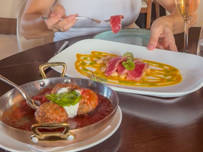 Wagyu meatballs in pomodoro sauce and Bluefin tuna crudo served at Serafina Miami