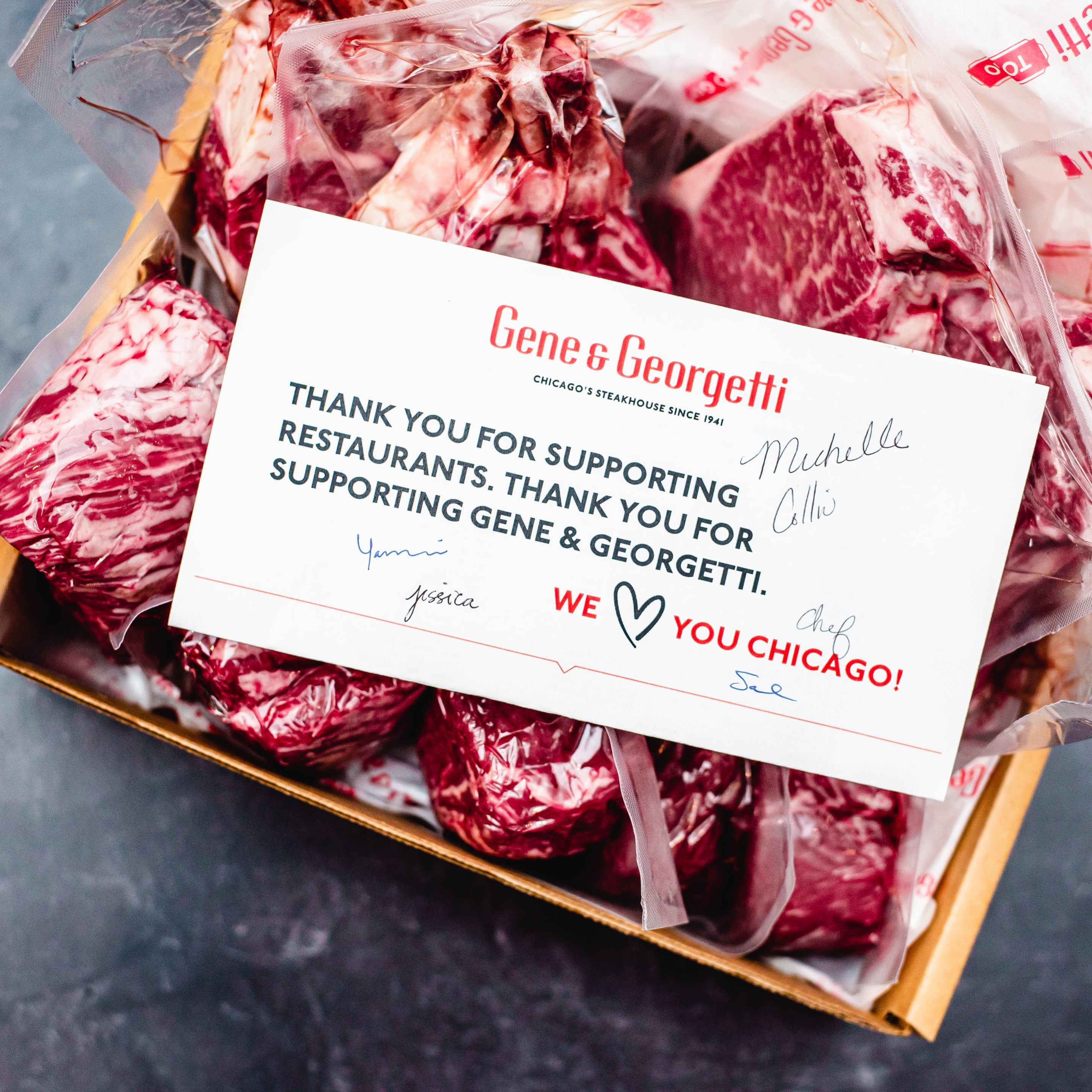 Vacuum-sealed steaks from Gene & Georgetti with a handwritten thank you note