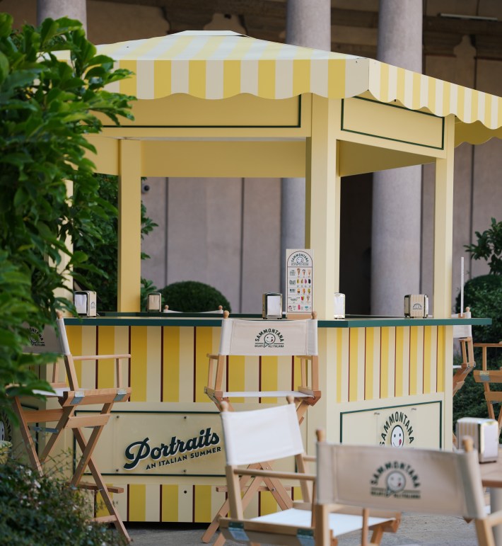 Sammontana gelato kiosk with yellow striped awning at Portrait Milano.