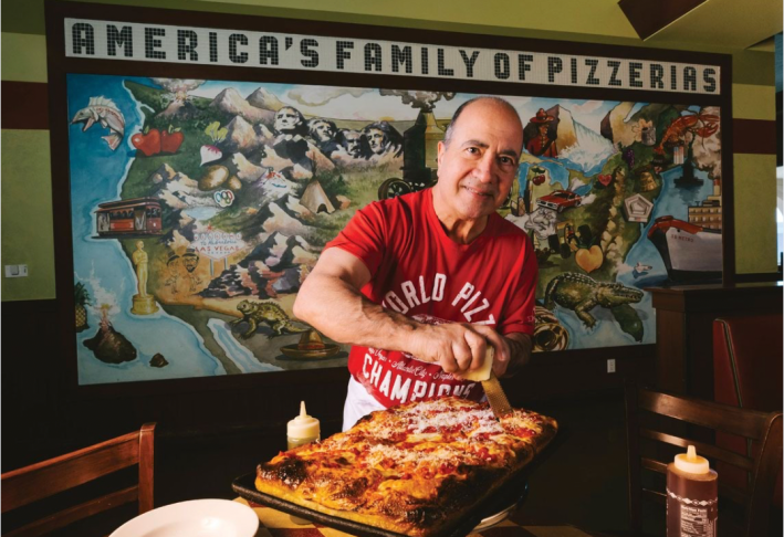 John Arena at Truly Pizza Dana Point receiving Icon Award from 50 Top Pizza USA 2025