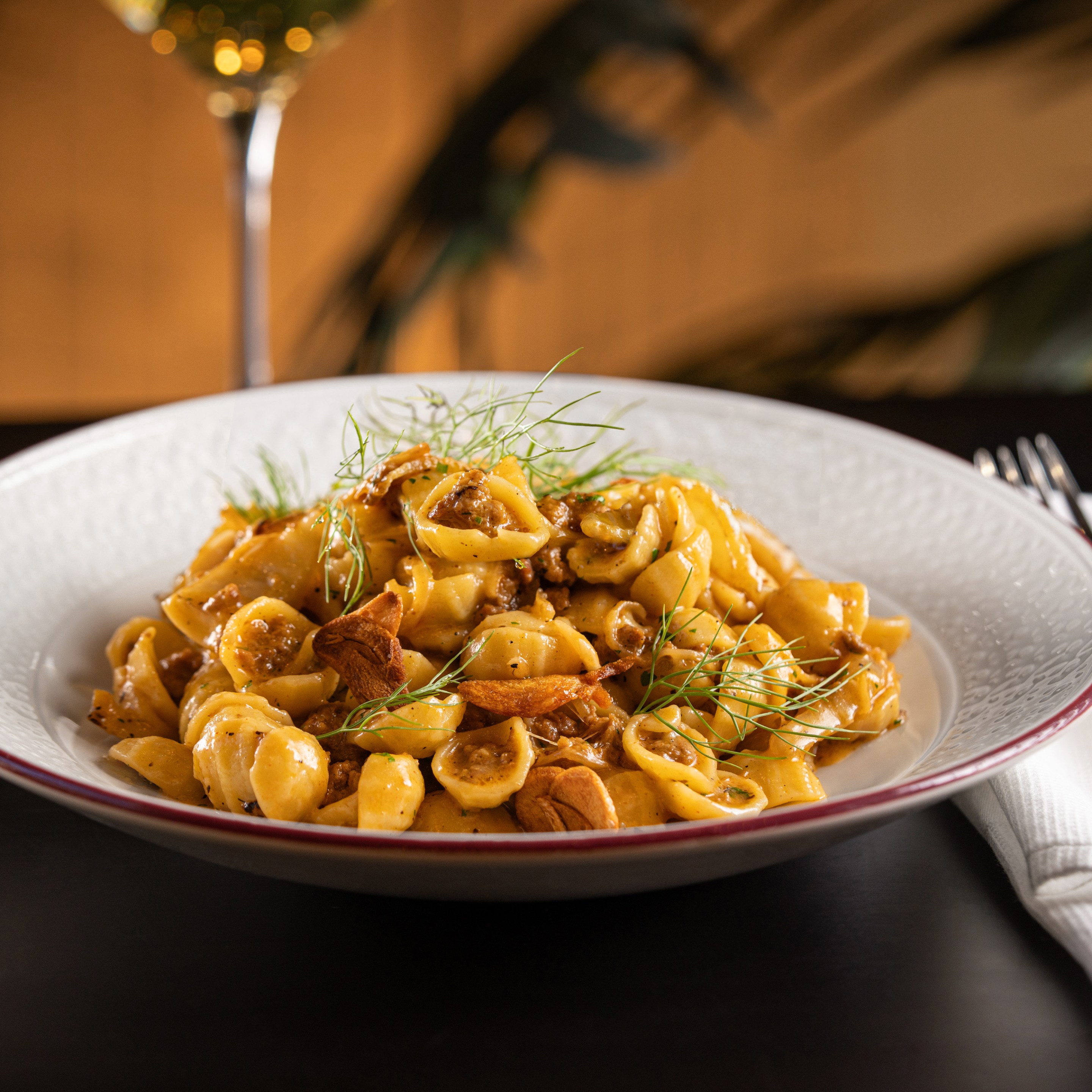 Orecchiette pasta dish at ai Pazzi in a white bowl.
