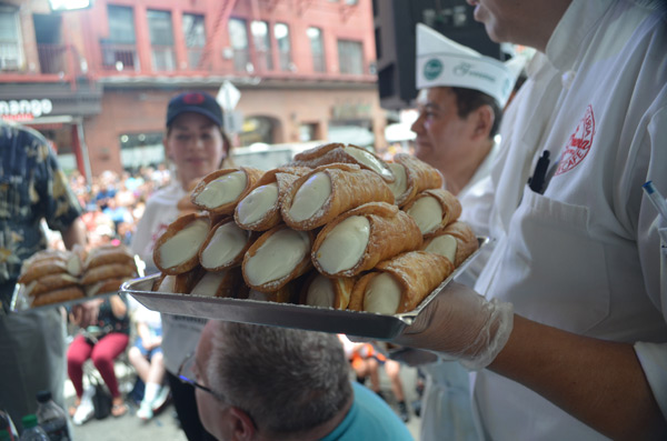 Stacked cannoli served during the Feast of San Gennaro in Little Italy, Manhattan.