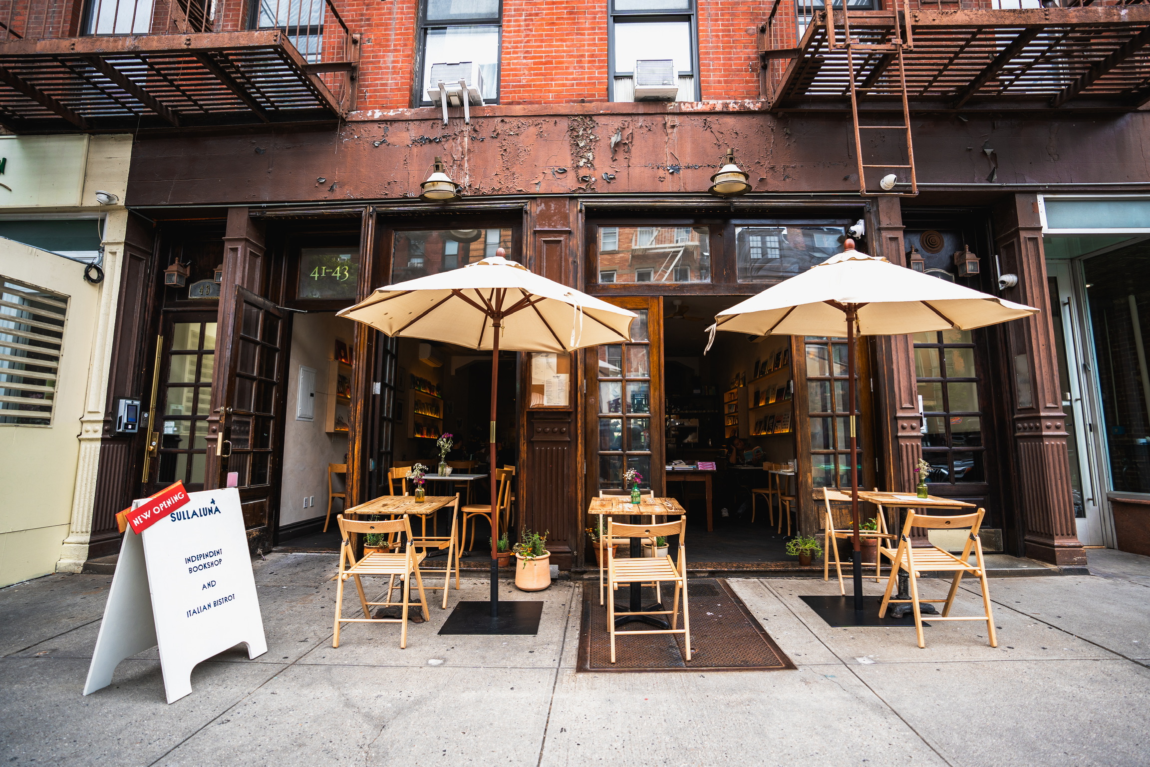 The exterior of SULLALUNA Bookshop & Bistrot in NYC.
