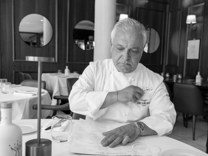 Chef Salvo Lo Castro reviewing the menu inside his SoHo restaurant CasaSalvo