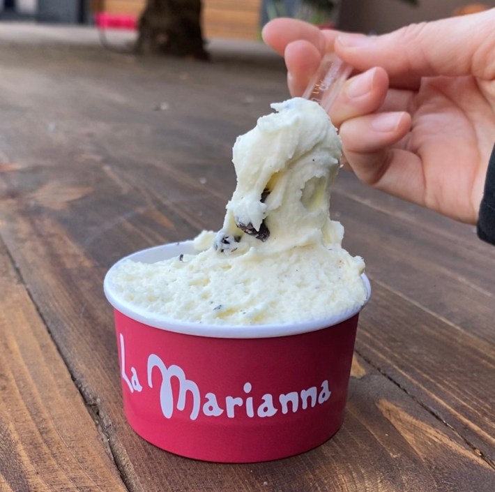 Cup of stracciatella gelato with chocolate flakes at La Marianna gelateria