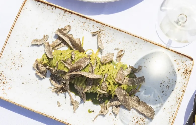 Norcia black truffle tagliolini. A signature dish from Borgo dei Conti Resort by Michelin-star Chef Emanuele Mazzella. Photo credit: Dario Garofalo.