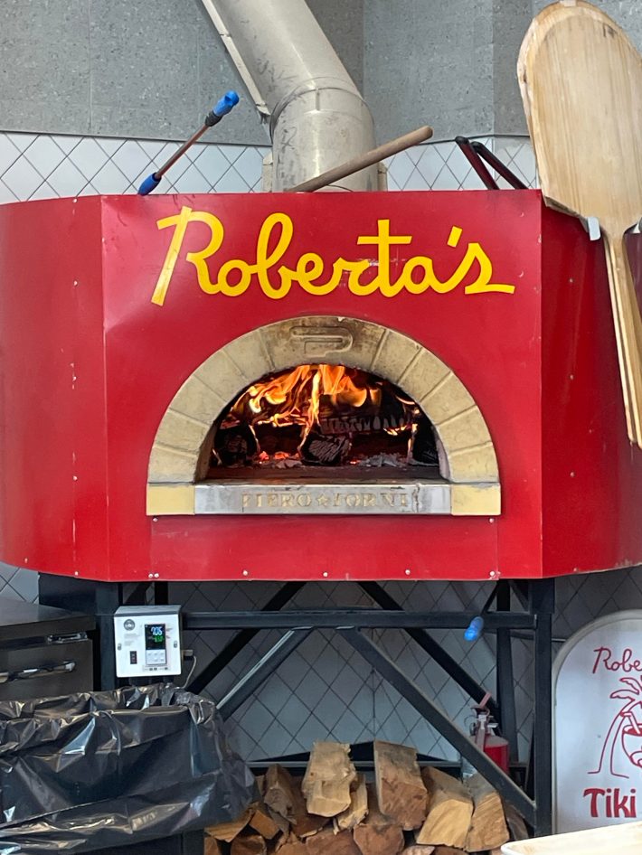 A wood-fired pizza oven at Roberta's.