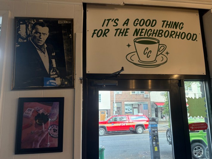 Interior of Casa Cugine with Frank Sinatra photo and Italian-American décor.