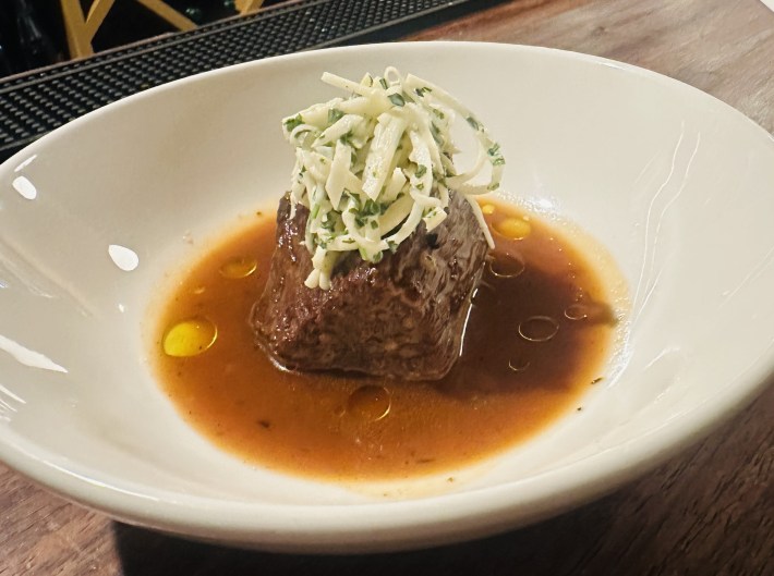 Slow-braised brisket topped with celery root remoulade at Gina’s on Congress in downtown Austin