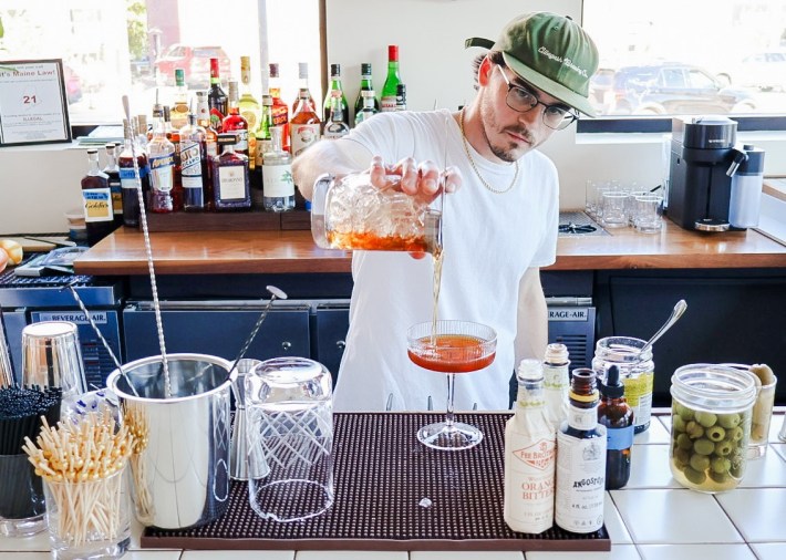 Owner Cole Curcio pours a cocktail at Abbiocco in Maine