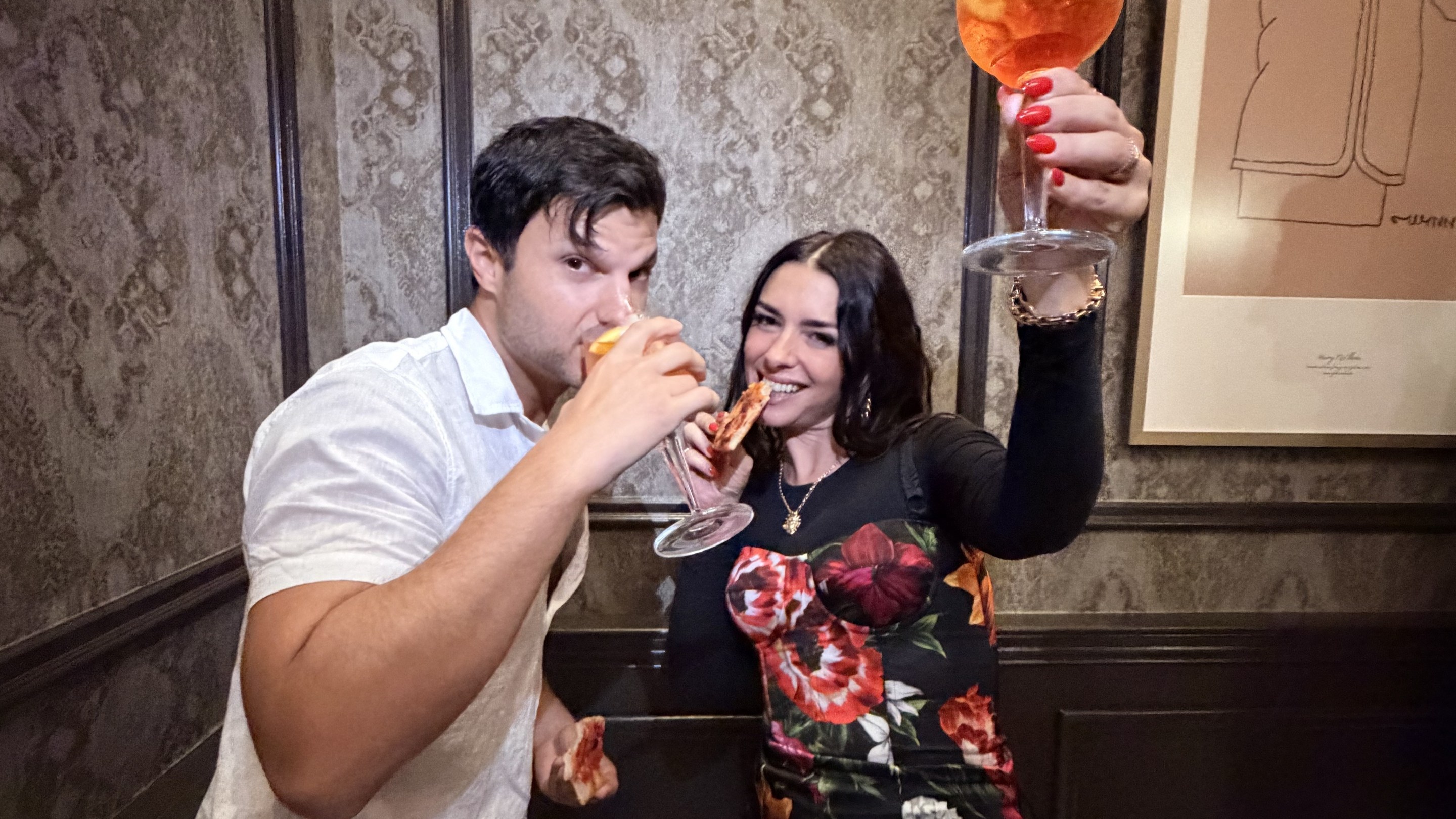 Nadia Caterina Munno raises an Aperol Spritz with a friend during an event at Campari’s New York headquarters.
