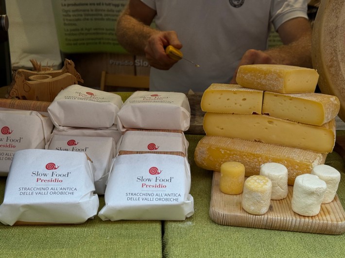 Slow Food Presidio cheeses wrapped and stacked at Cheese festival in Bra.