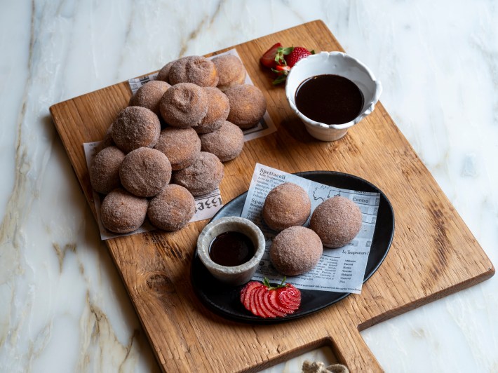 Zeppole doughnuts with cinnamon sugar and chocolate sauce at Bottega Napa Valley.