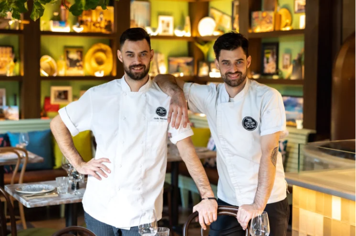 Chefs Giulio and Enrico Marchese standing in Italian Street Kitchen